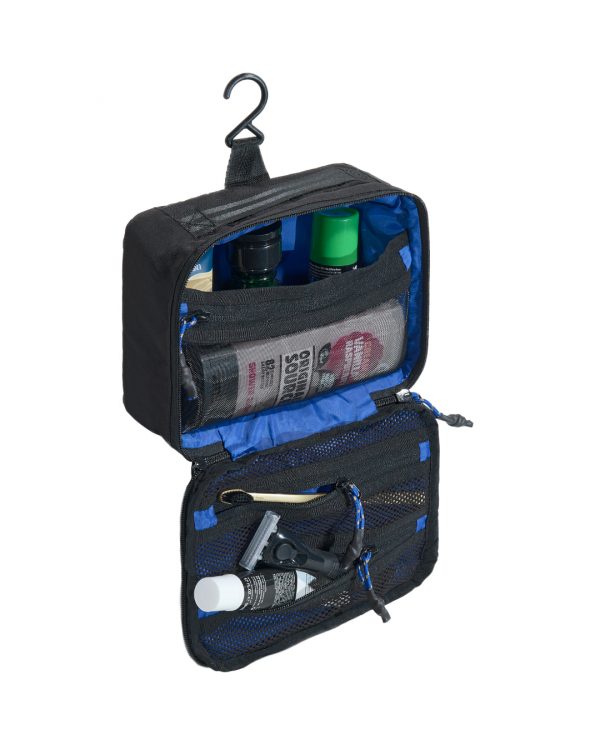 Open hanging view of the SYMA Refine Toiletry Kit in black with a vibrant blue lining, highlighting its built-in hanging hook, internal mesh organization pockets, grooming elastic loops, and durable water-resistant nylon construction