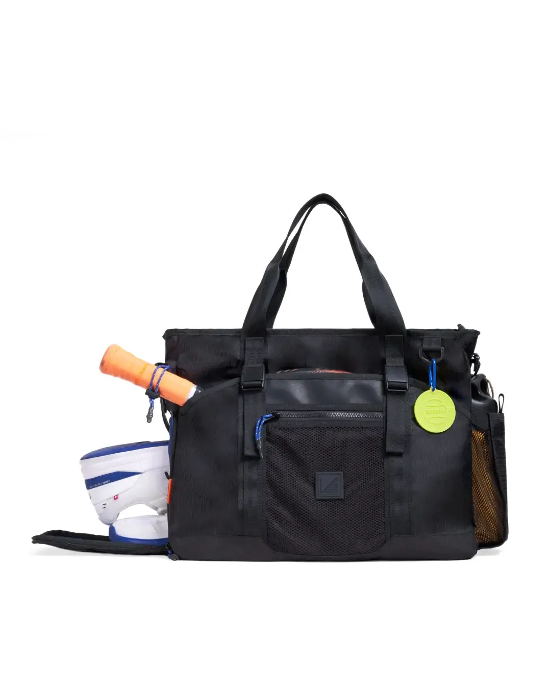 Front view of SYMA Miles Racket-Tote Black showing open shoe compartment and bag charm. Padel & tennis bag