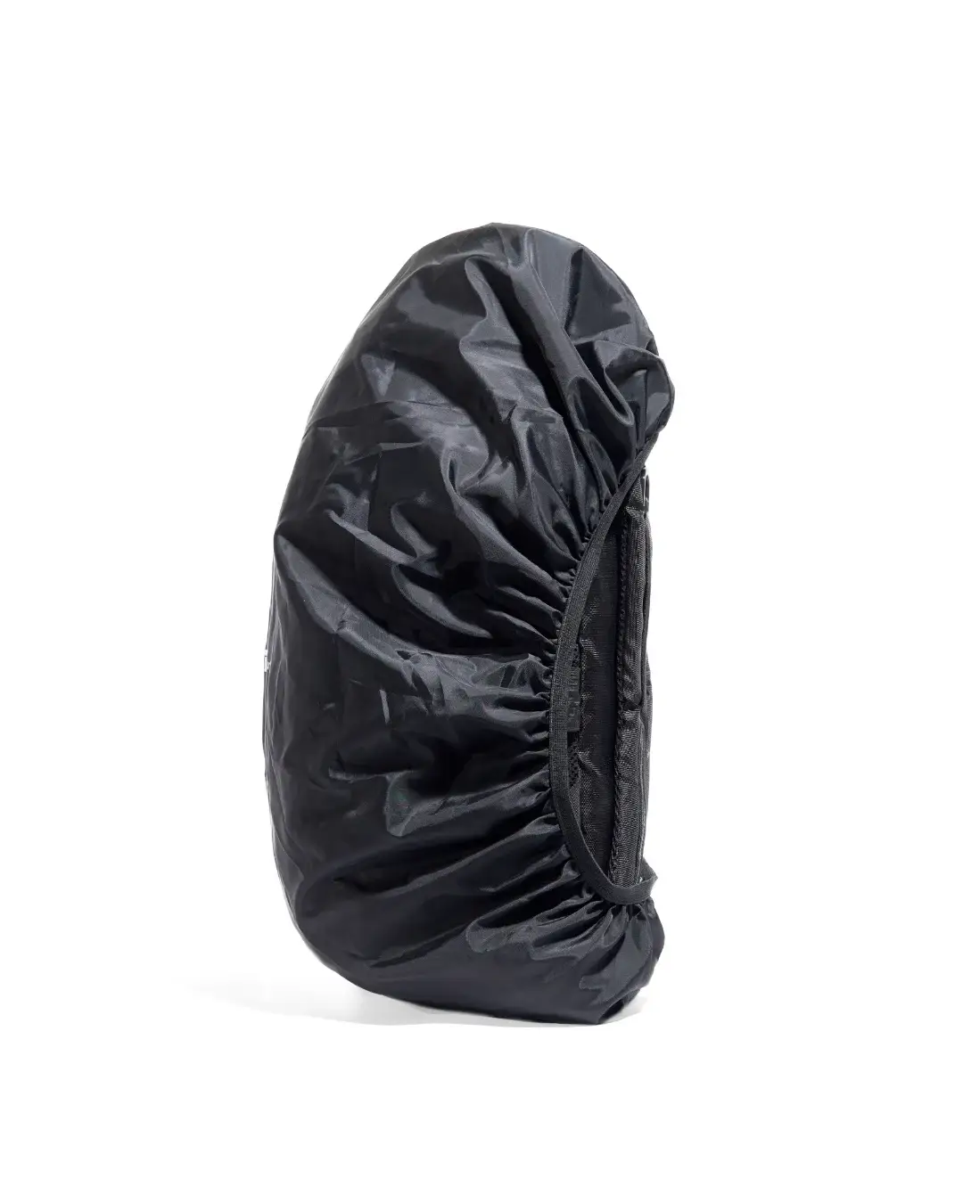 Back-angled side view of black SYMA Daytripper tightly gripping the bag's rear panel, highlighting its deep elastic binding. Packable backpack rain cover.