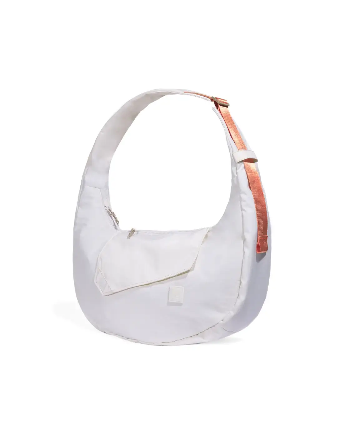 Angled view of SYMA Fable Sling Bag Light Cream highlighting contrast strap details. Minimalist everyday sling bag