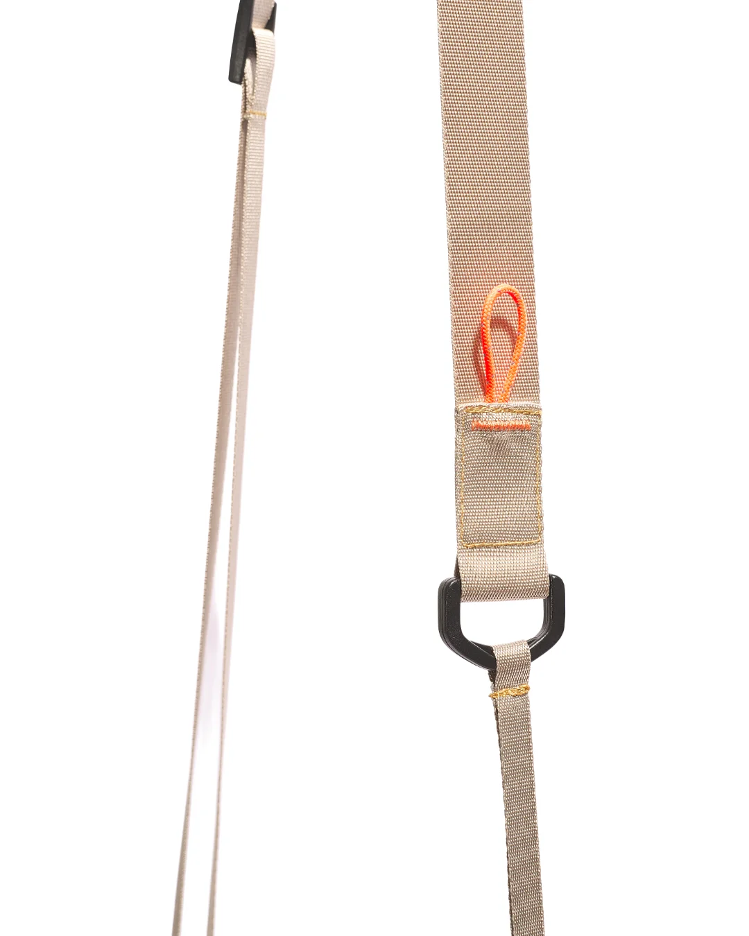 Extreme close-up detail of the SYMA Mantra khaki sacoche bag strap, showing the khaki nylon webbing, a black D-ring adjuster, reinforced orange box stitching, and a high-visibility orange paracord pull loop